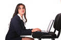 Businesswoman laptop and chair