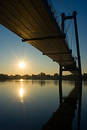 Suspension bridge in sunrise