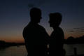 Sillhouette of man and wife at sunset