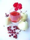 Red drink with autumn gifts