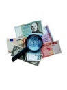 Magnifier on different banknotes