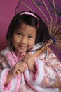 Little chinese girl with unbrella free stock image
