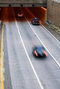 Cars Speed into Tunnel with Motion Blur free stock photo